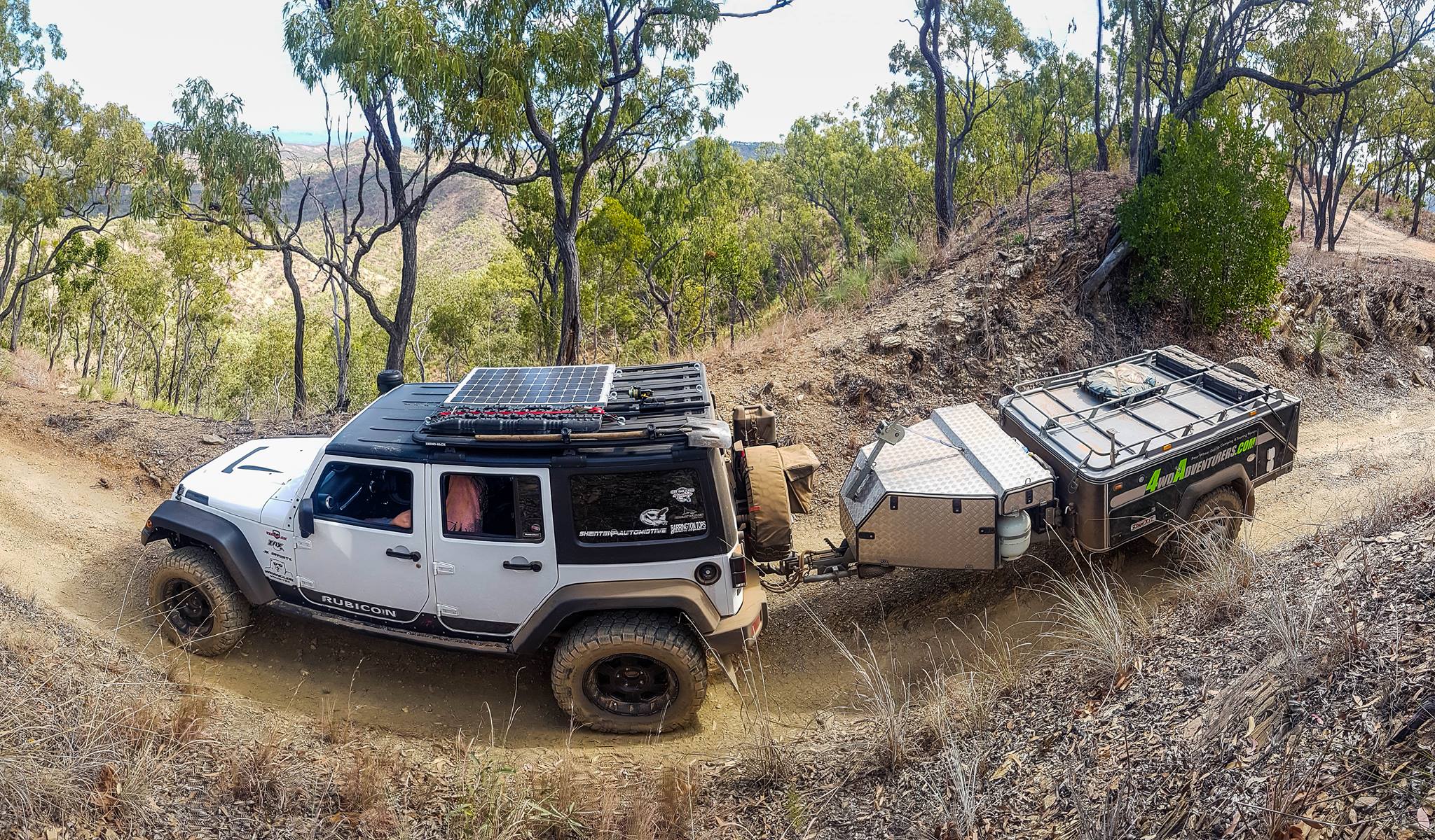 Fish eye image of vehicle on the dirt track