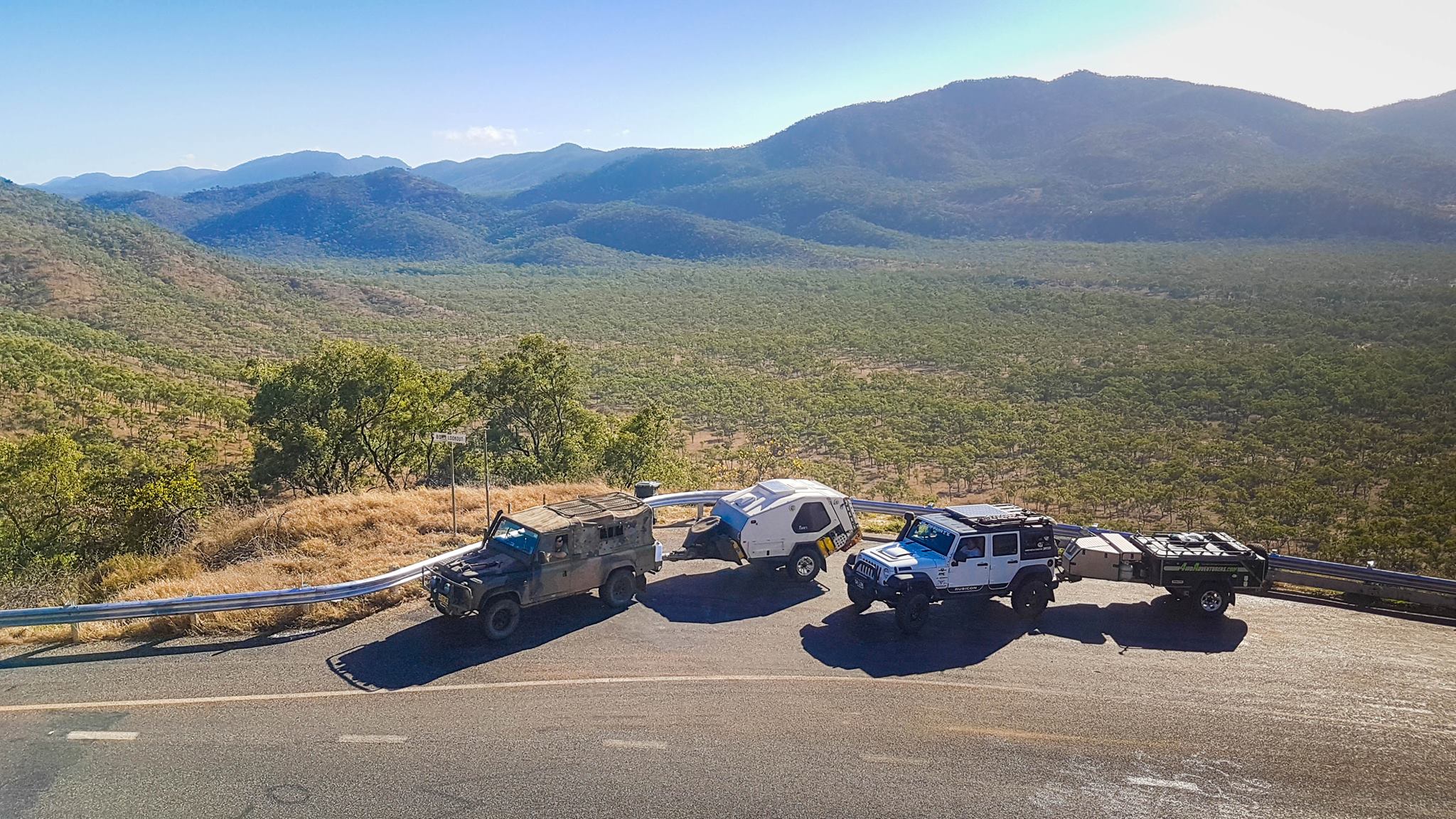 Jeeps parked at a roadside lookout