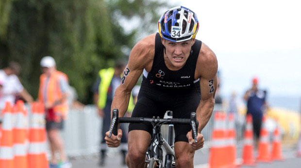 Triathlete Braden Currie competing in a cycling event