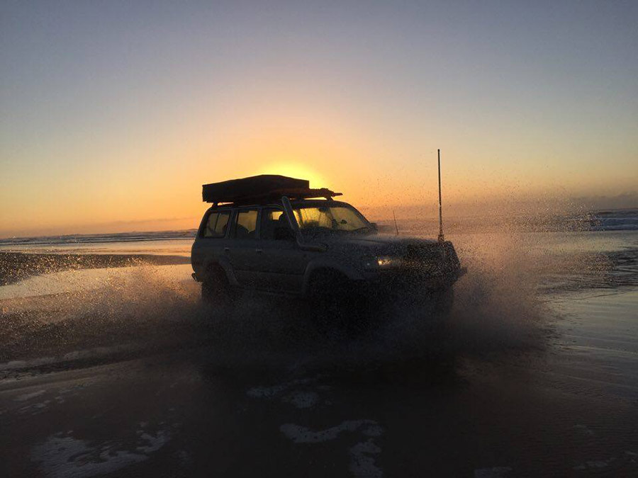Sunset on the beach 4 wheel driving